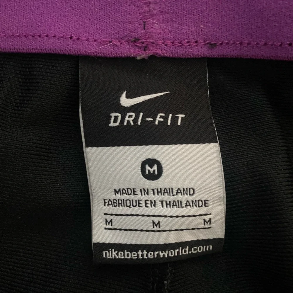 Nike Women's Black Shorts with Purple Accents